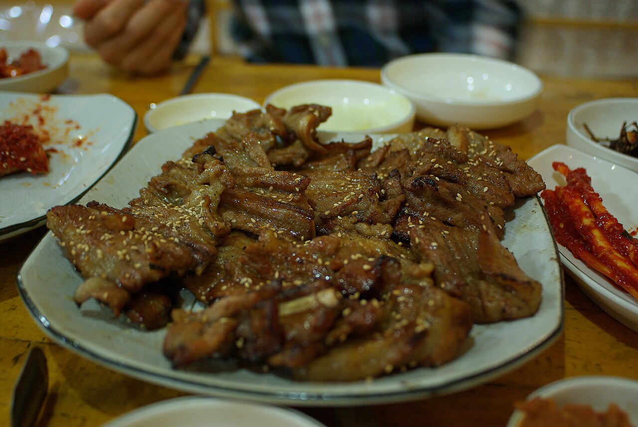 A plate of grilled, sesame-topped marinated pork galbi
