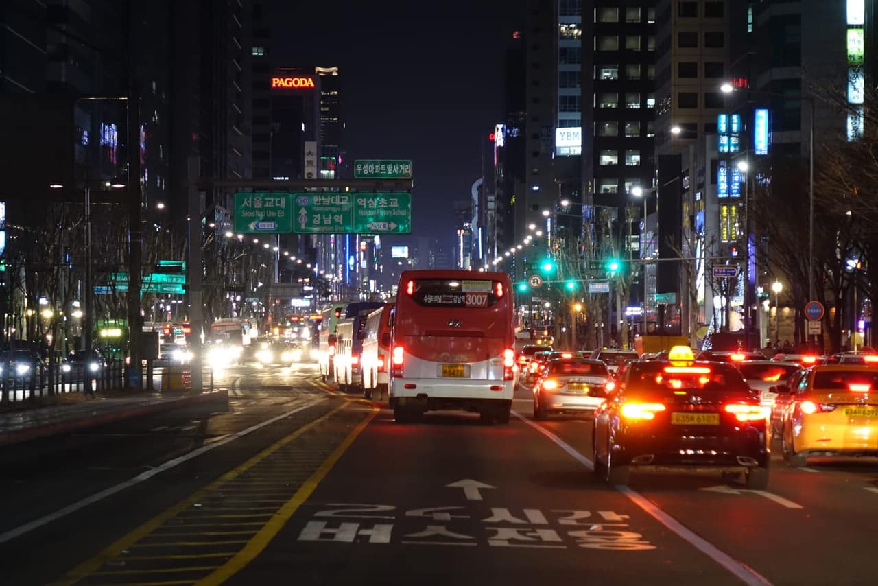 Gangnam-daero at night, with buses and taxis